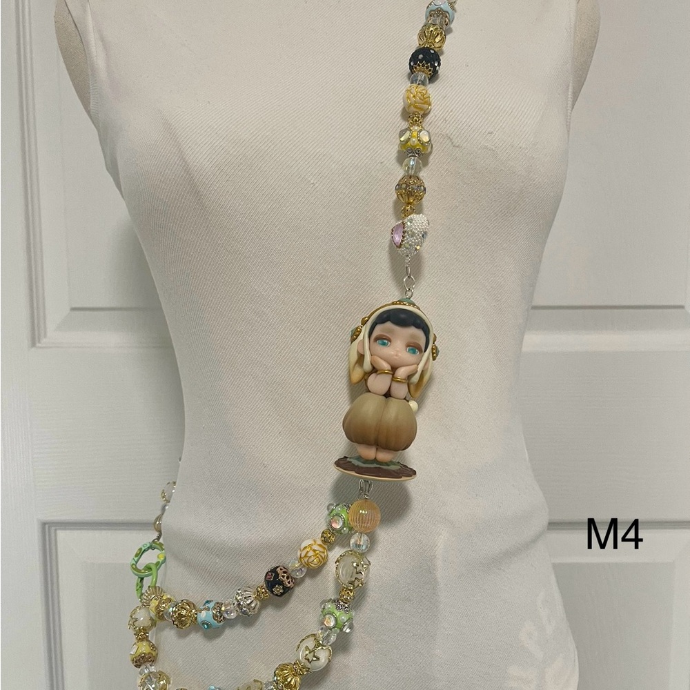 Colorful Beaded Necklace with Doll Pendant